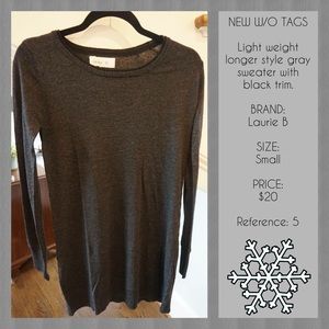 Grey Sweater with Black Trim New without tags.